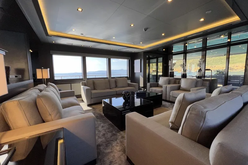 Smooth Operator Yacht Photos Pics Luxurious interior of 2011 Jongert 39m yacht with elegant seating and panoramic windows.