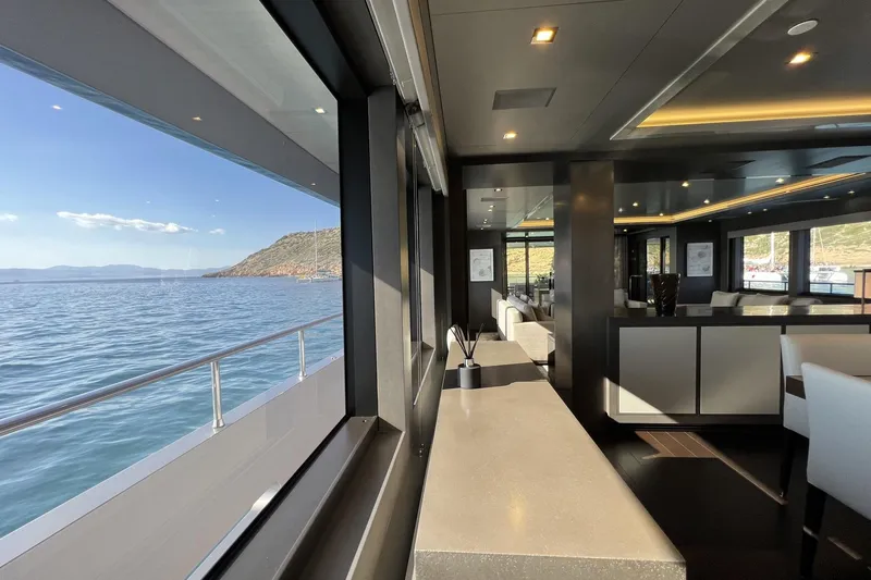 Smooth Operator Yacht Photos Pics Luxurious interior of 2011 Jongert 39m yacht with ocean view through large windows.