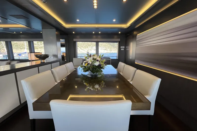 Smooth Operator Yacht Photos Pics Luxurious dining area on 2011 Jongert 39m yacht with elegant decor and scenic views.