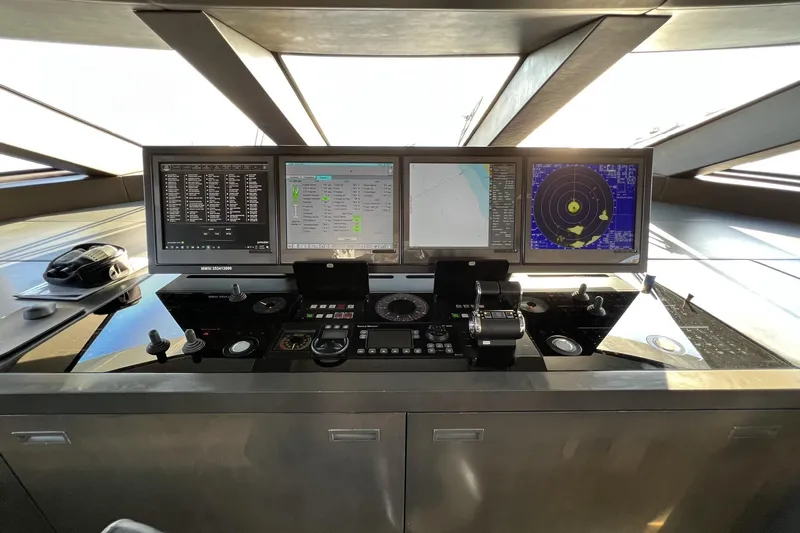 Smooth Operator Yacht Photos Pics Control panel of a 2011 Jongert 39m yacht with navigation screens and controls.
