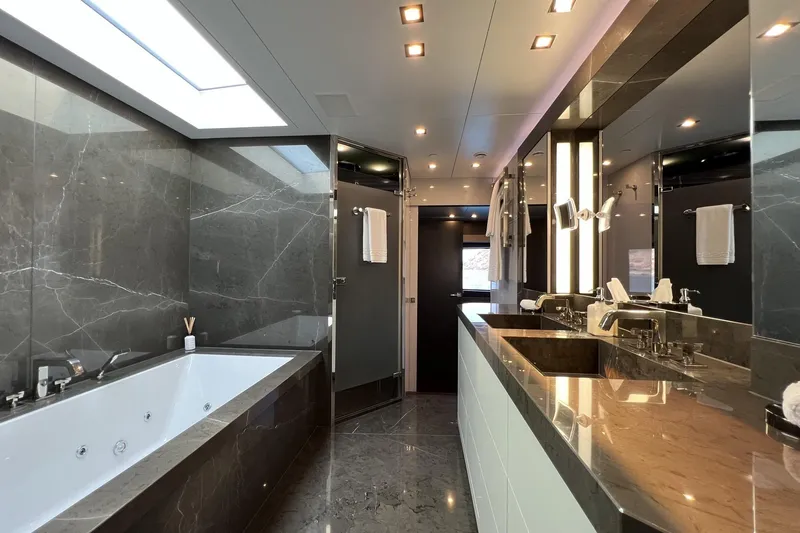 Smooth Operator Yacht Photos Pics Luxurious bathroom on 2011 Jongert 39m yacht, featuring marble surfaces and modern fixtures.