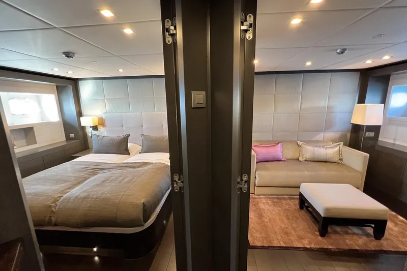 Smooth Operator Yacht Photos Pics Luxurious Jongert 39m yacht bedroom interior, featuring elegant bed, sofa, and modern lighting, 2011 model.
