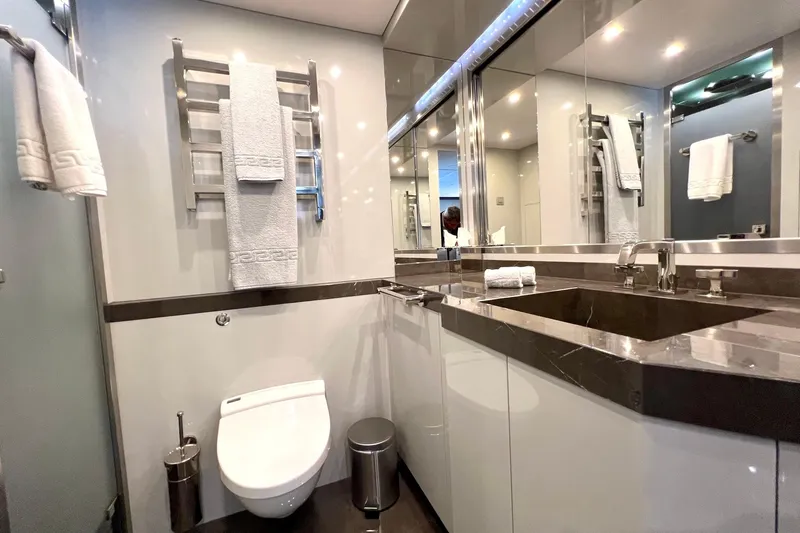 Smooth Operator Yacht Photos Pics Luxurious bathroom in a 2011 Jongert 39m yacht, featuring modern fixtures and elegant design.