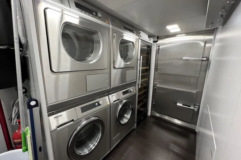 Smooth Operator Yacht Photos Pics Laundry room with Miele appliances on a 2011 Jongert 39m yacht.