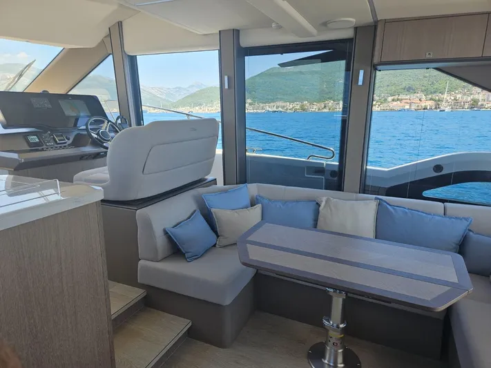  Yacht Photos Pics Luxurious interior of 2024 Galeon 440 Fly yacht with scenic ocean view.
