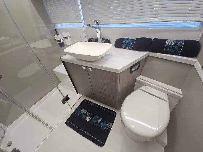  Yacht Photos Pics Modern bathroom in 2024 Galeon 440 Fly yacht with sleek fixtures and elegant design.