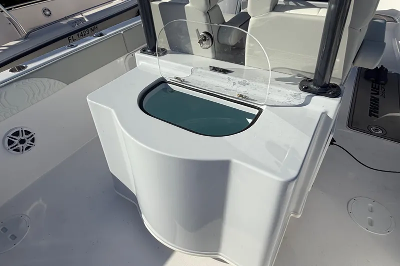  Yacht Photos Pics 2026 Twin Vee 280 GFX2 CC boat interior with seating and storage area.