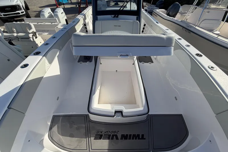  Yacht Photos Pics 2026 Twin Vee 280 GFX2 CC boat interior with open storage compartment.