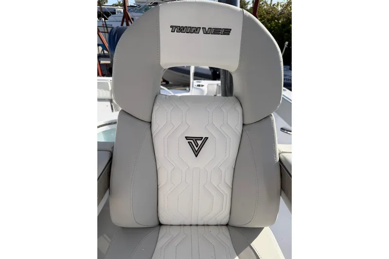  Yacht Photos Pics 2026 Twin Vee 280 GFX2 CC boat seat with logo and stylish design.