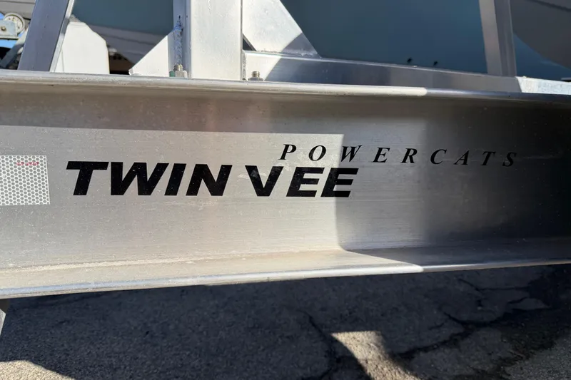  Yacht Photos Pics 2026 Twin Vee 280 GFX2 CC Powercats logo on metallic surface.