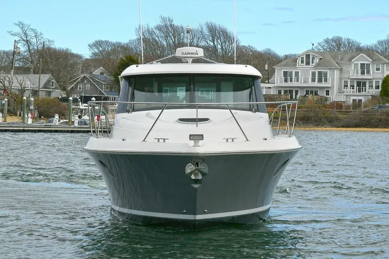 Double Diamond Yacht Photos Pics 2018 Tiara Yachts 39 Coupe on water, front view, near coastal homes.