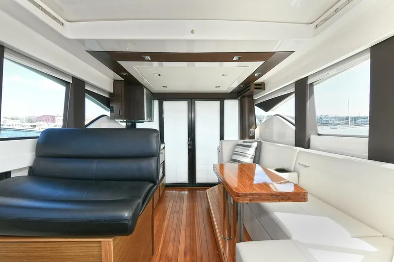 Double Diamond Yacht Photos Pics Interior of 2018 Tiara Yachts 39 Coupe, featuring sleek seating and modern design.