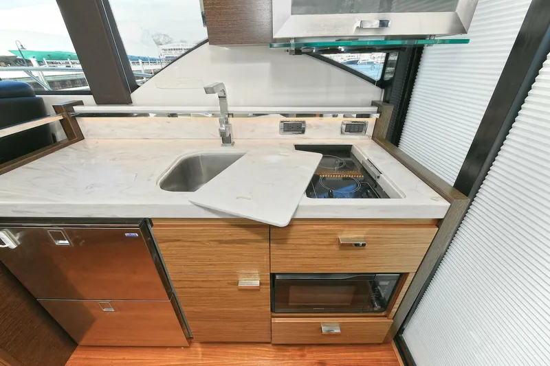 Double Diamond Yacht Photos Pics Modern kitchen area in 2018 Tiara Yachts 39 Coupe with sink and appliances.