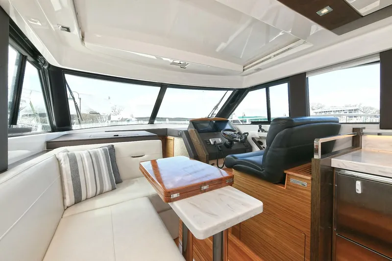 Double Diamond Yacht Photos Pics Interior of 2018 Tiara Yachts 39 Coupe, featuring luxurious seating and modern design.