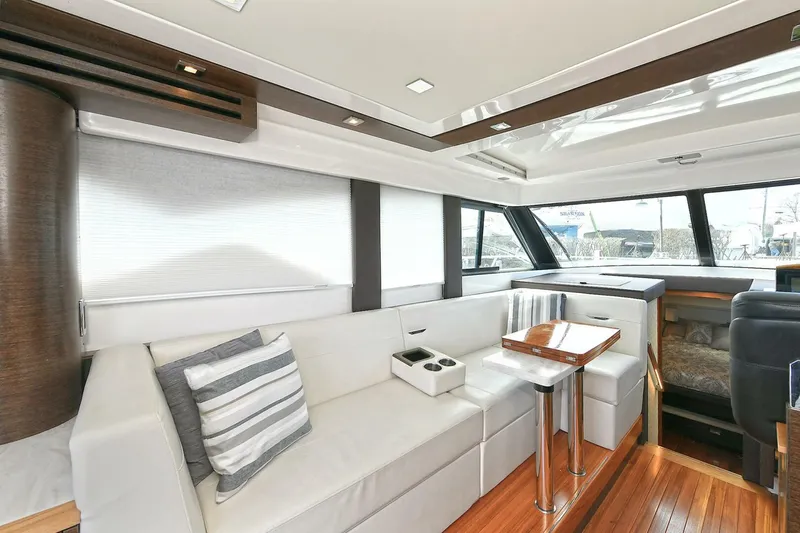 Double Diamond Yacht Photos Pics Luxurious interior of 2018 Tiara Yachts 39 Coupe with elegant seating and modern design.