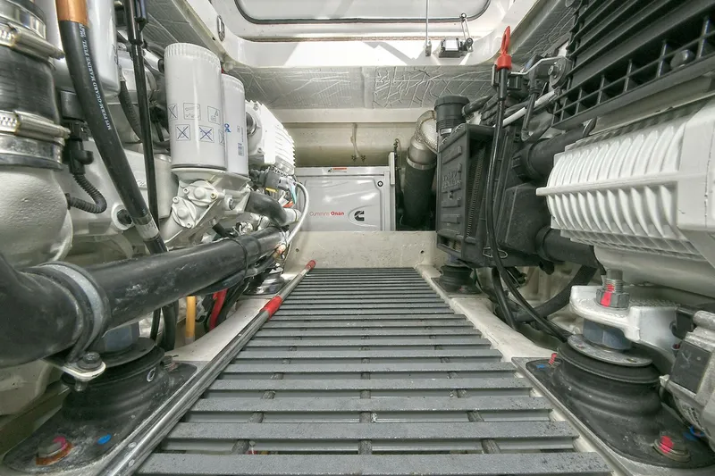 Double Diamond Yacht Photos Pics Engine room of 2018 Tiara Yachts 39 Coupe, showcasing mechanical components and systems.