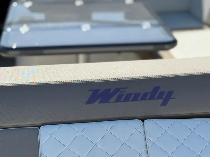  Yacht Photos Pics 2023 Windy 37 Shamal boat interior with logo and quilted seating.