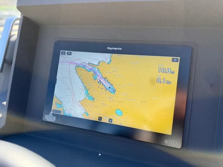  Yacht Photos Pics Navigation display on 2023 Windy 37 Shamal boat, showing nautical chart and speed.
