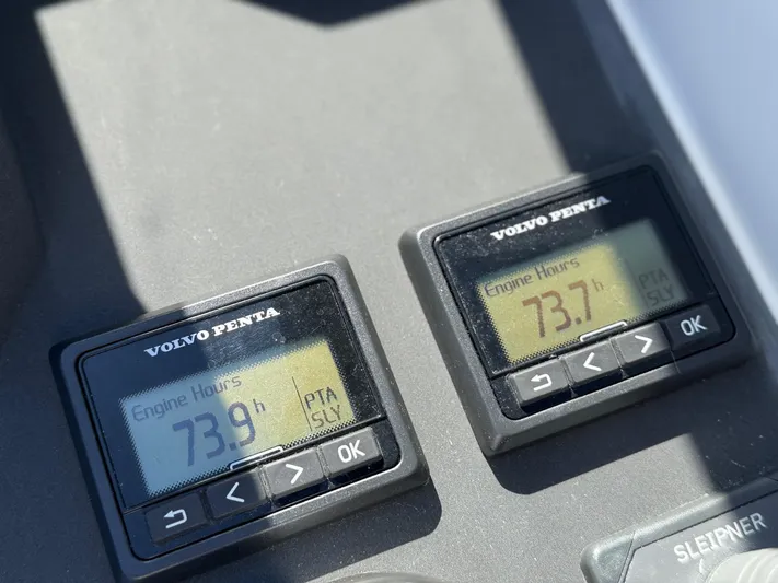  Yacht Photos Pics Volvo Penta engine hour meters displaying 73.9 and 73.7 hours on Windy 37 Shamal.