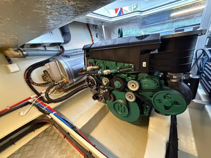  Yacht Photos Pics Engine compartment of 2023 Windy 37 Shamal boat, showcasing modern mechanical components.