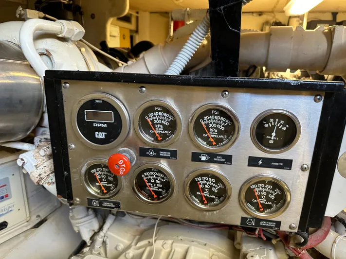  Yacht Photos Pics Control panel of a 1998 Ferretti Yachts 80 engine room with various gauges.
