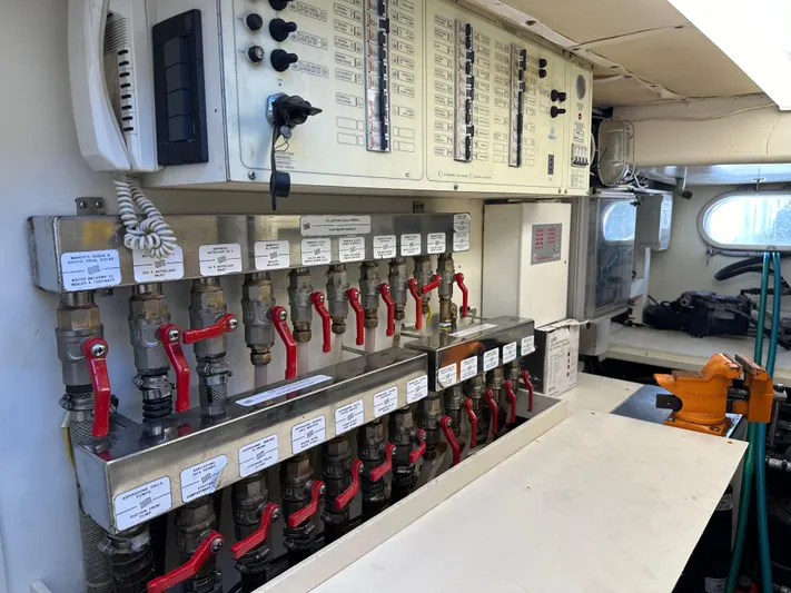 Yacht Photos Pics Control panel and valves in a 1998 Ferretti Yachts 80 engine room.