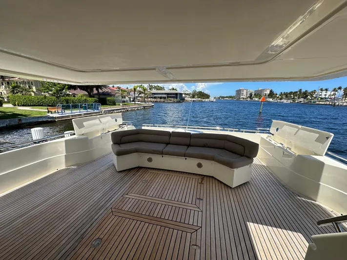  Yacht Photos Pics Luxurious 1998 Ferretti Yachts 80 with spacious deck and waterfront view.