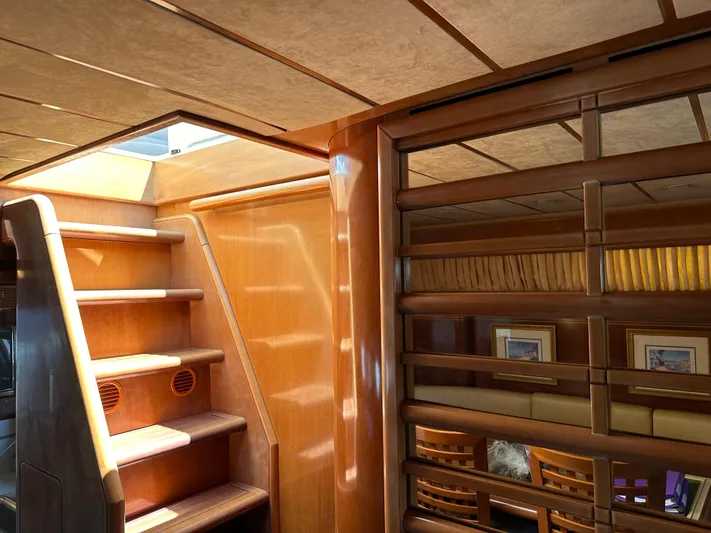  Yacht Photos Pics Luxurious interior of 1998 Ferretti Yachts 80, featuring wooden stairs and elegant design elements.