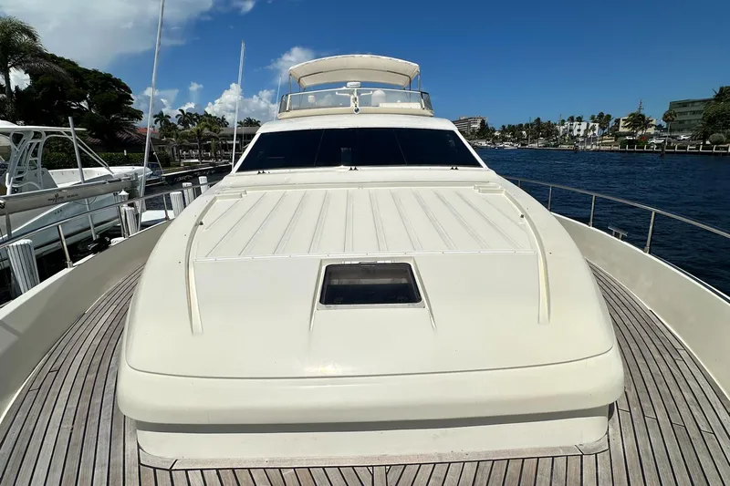  Yacht Photos Pics 1998 Ferretti Yachts 80 on water, showcasing sleek design and spacious deck.
