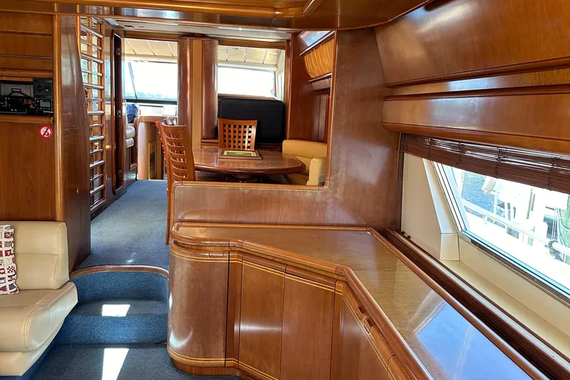  Yacht Photos Pics Luxurious interior of a 1998 Ferretti Yachts 80 with elegant wood finishes.