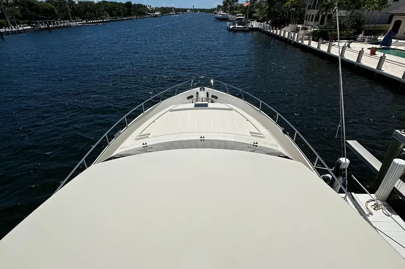  Yacht Photos Pics Bow view of 1998 Ferretti Yachts 80 on a serene waterway.
