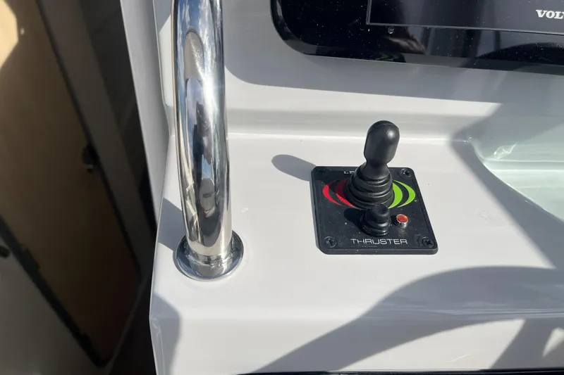  Yacht Photos Pics 2023 Regal 28 Express boat thruster control with joystick and chrome handle.
