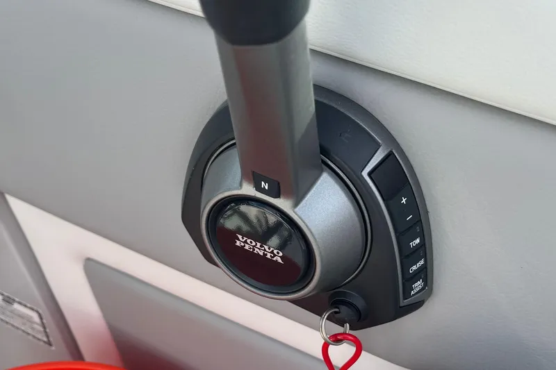  Yacht Photos Pics Throttle control of 2023 Regal 28 Express boat with Volvo Penta branding.