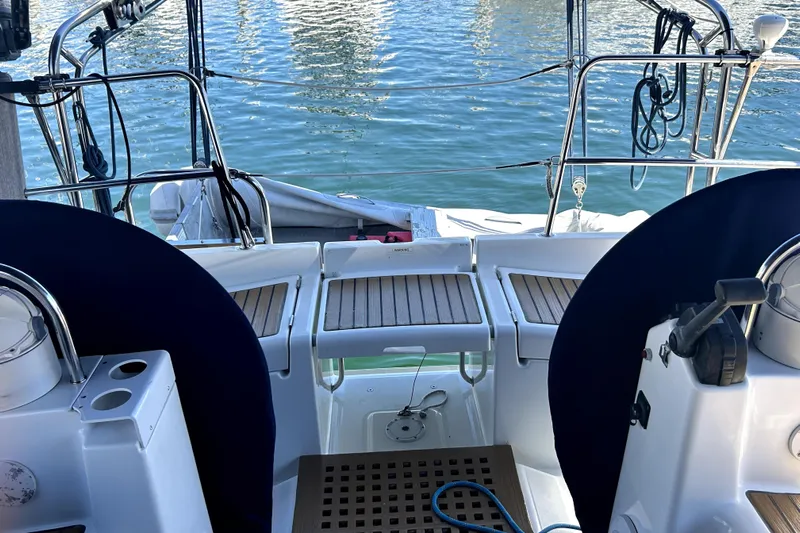 Dionysus Yacht Photos Pics Cockpit view of 2003 Beneteau Oceanis Clipper 473 sailboat with dual steering wheels.