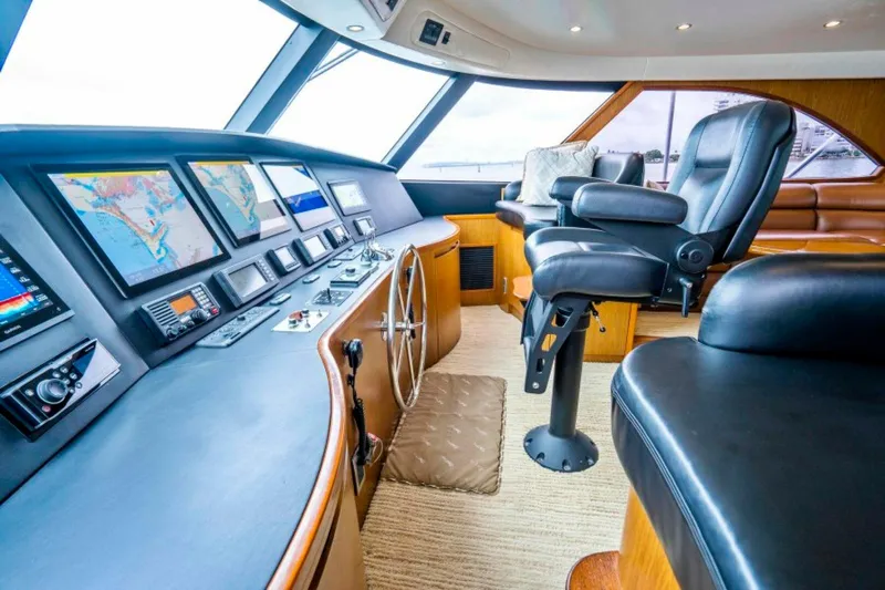 Last Call Yacht Photos Pics Luxurious 2011 Viking 70 Enclosed Bridge yacht interior with advanced navigation systems.