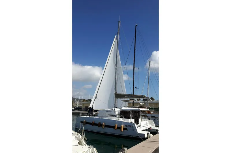 Yacht Photos Pics 2016 Bali Catamarans Bali 4.0 docked at marina under clear blue sky.