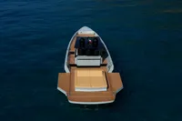 Seanfinity T5 2021 boat on water, featuring sleek design and spacious deck.