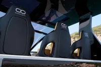 Luxurious Seanfinity T5 2021 boat seats with sleek design and scenic background.