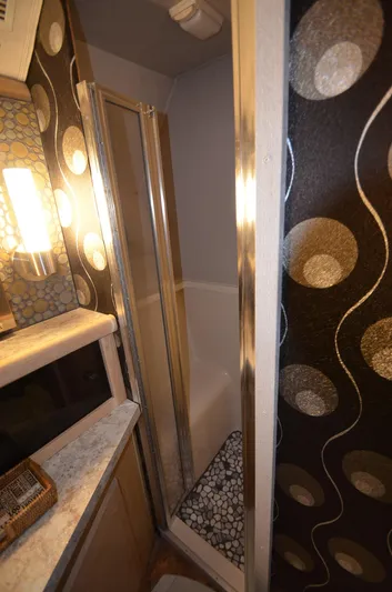 Suite Forty Six Yacht Photos Pics 1989 Silverton Aft Cabin 46 bathroom with modern shower and stylish decor.