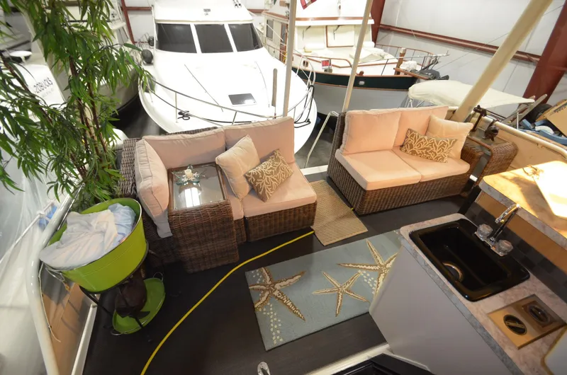 Suite Forty Six Yacht Photos Pics Luxurious 1989 Silverton Aft Cabin 46 yacht interior with cozy seating and elegant decor.