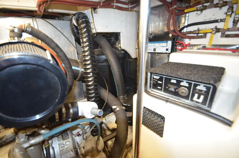 Suite Forty Six Yacht Photos Pics Engine room of 1989 Silverton Aft Cabin 46 with visible components and wiring.