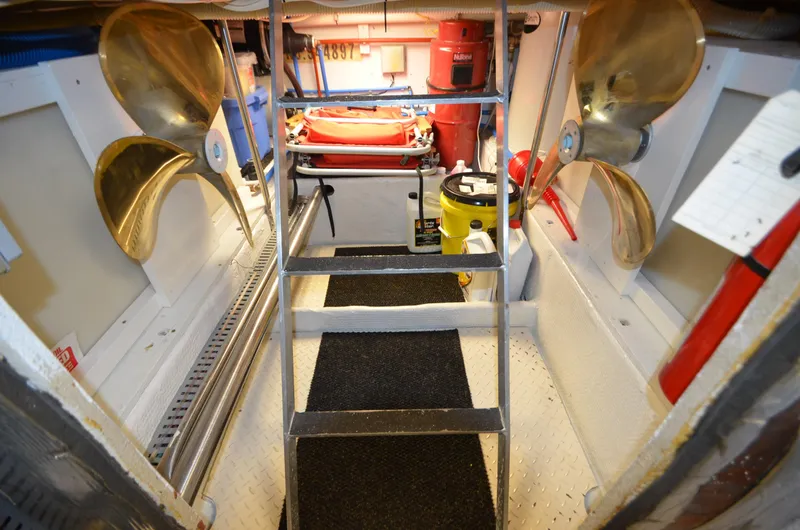 Suite Forty Six Yacht Photos Pics Engine room of 1989 Silverton Aft Cabin 46 with propellers and equipment.