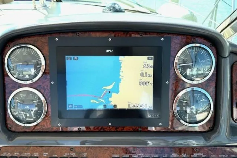  Yacht Photos Pics Dashboard of 2003 Sea Ray 420 Sundancer with navigation display and gauges.