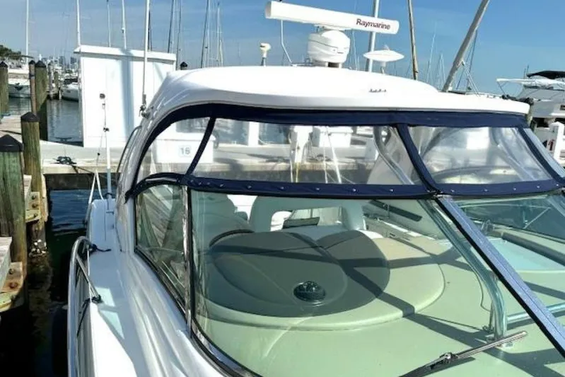  Yacht Photos Pics 2003 Sea Ray 420 Sundancer yacht docked at a marina, featuring a sleek design.