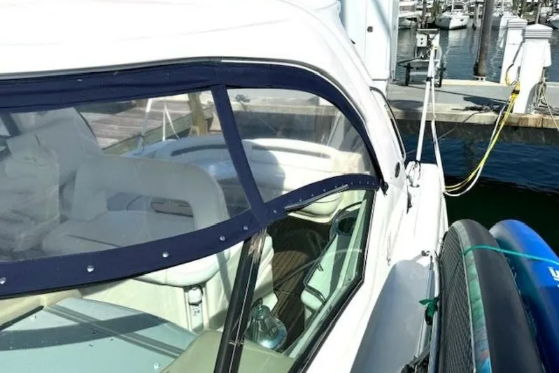  Yacht Photos Pics 2003 Sea Ray 420 Sundancer yacht docked at marina, featuring sleek design and spacious interior.