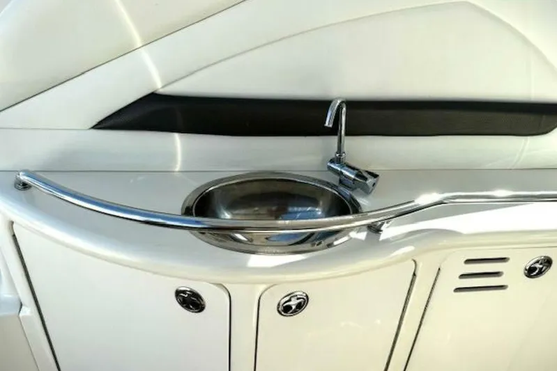  Yacht Photos Pics 2003 Sea Ray 420 Sundancer yacht sink with chrome faucet and sleek design.