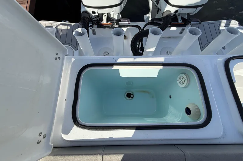  Yacht Photos Pics 2023 Cape Horn 32 XS boat livewell with rod holders and dual engines.