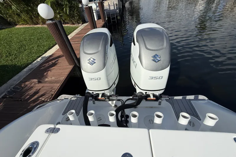  Yacht Photos Pics 2023 Cape Horn 32 XS boat with dual Suzuki 350 outboard engines at dock.