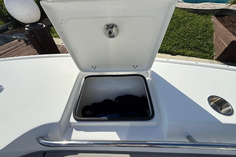  Yacht Photos Pics Open storage compartment on 2023 Cape Horn 32 XS boat deck.