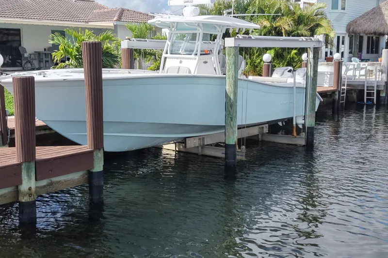  Yacht Photos Pics 2023 Cape Horn 32 XS boat docked at a waterfront property.